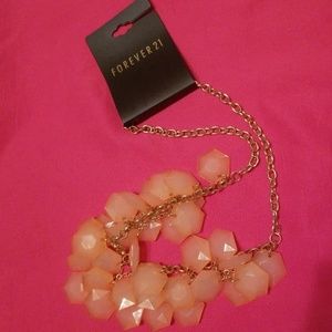 Peach and gold necklace